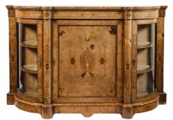 A Victorian walnut credenza:, the central door with sycamore inlaid decoration after the classical,