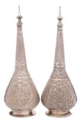 A pair of Indo-Persian silver flasks and stoppers:, of ovoid form with long slender necks,