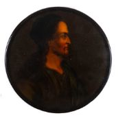 A 19th century papier mache snuff box: the circular lid decorated with a portrait of an Italian