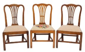 A set of six George III mahogany dining chairs:,