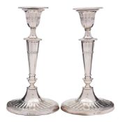 A pair of Victorian silver candlesticks, maker William Hutton & Sons Ltd, London,