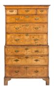 An early 18th Century walnut and cross and feather banded chest on chest:,