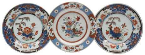 A pair of Chinese verte Imari plates and one other: the pair painted with lotus,