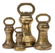 A set of four 19th century graduated brass weights: of bell-shaped outline with loop carrying