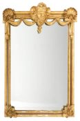 A Continental carved giltwood and gesso rectangular wall mirror:,