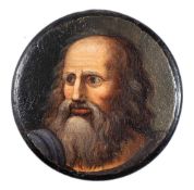 A 19th century papier mache snuff box: the circular lid decorated with a portrait of a bearded