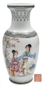 A Chinese porcelain vase: of baluster form decorated with two elegant ladies in a garden setting