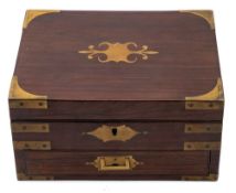 A 19th century rosewood and brass mounted lady's travelling vanity box: of rectangular outline,