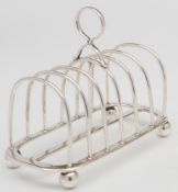 A George V silver six-division toast-rack,