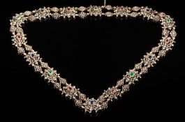 A late 19th or early 20th century continental gem-set necklace: with sixteen cushion-shaped links