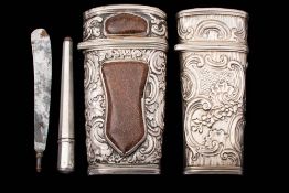 A 19th century silver and enamel necessaire, unmarked: most accessories missing, 9cm.