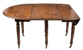 An early 19th century mahogany oval drop flap extending dining table:,