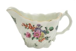 A First Period Worcester 'Chelsea ewer' cream jug: spirally moulded with acanthus leaves from the