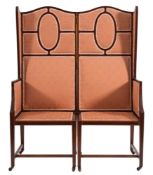 An Edwardian mahogany and inlaid hinged wing settee:, of Aesthetic movement design,