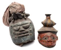 An early 20th century Yoruba (Nigeria) gelede carved wood and polychrome decorated mask: of