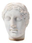 After the Antique, a carved marble head of a Roman Goddess: 27cm. high.