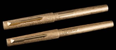 A Parker '105' fountain pen and ball set: of rolled gold bark effect,