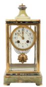 An onyx and enamel French mantel clock: the eight-day duration movement striking the hours and