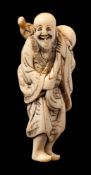 A Japanese carved ivory netsuke: depicting Chockaro Senin dressed in traditional robes decorated