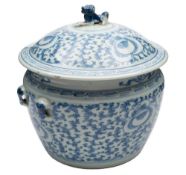 A Chinese blue and white bowl and cover: the domed cover with lion dog finial,