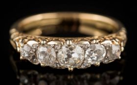 A 19th century graduated diamond five-stone ring: with round old,