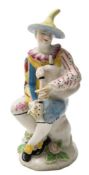 A Bow figure of Harlequin playing the bagpipes: after the Meissen original,