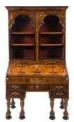 An early 18th Century Italian walnut and marquetry bureau bookcase:,