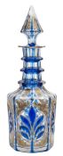 A 19th century Bohemian Persian market blue flashed and clear glass decanter and spire stopper: of
