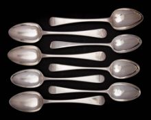 A collection of eight assorted Old English pattern tablespoons,