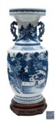 A Chinese Export blue and white vase: of baluster form with pierced chilong handles,