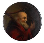 A 19th century papier mache snuff box: the circular lid decorated with a portrait of a bearded and