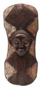 A West African tribal parrying shield: possibly from the Dan tribe (Ivory Coast),