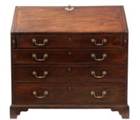 A George III mahogany bureau:,