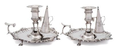 A pair of George II silver chambersticks, maker William Cafe, London, 1759: crested,