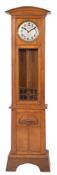 An Art Nouveau oak chiming longcase clock: the eight-day duration,