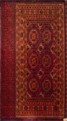 A Turkoman Juval:, the wine field with two rows of stepped octagonal medallions,