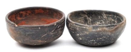 A Mayan pottery bowl: of plain circular form: 10cm. diameter, together with a similar bowl, 9.5cm.