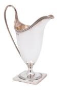 A George V silver cream jug, maker David & Maurice Davis, Birmingham,