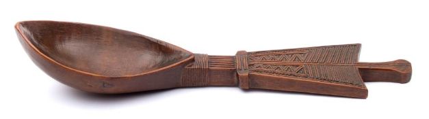 An African Kenya/Somali [Boni] carved fruitwood spoon: with pointed bowl,