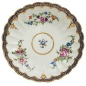A First Period Worcester 'Royal Marriage' pattern fluted dessert dish: painted with floral bouquets,