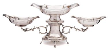 A silver plated twin-branch table centrepiece: the central cartouche-shaped dish on a waisted stem