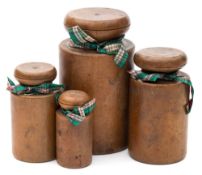 A graduated set of four 19th century turned sycamore pie dollies: of cylindrical form with mushroom