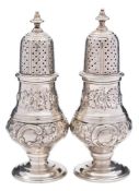 A pair of George V silver pepperettes, maker C S Harris & Sons Ltd, London,