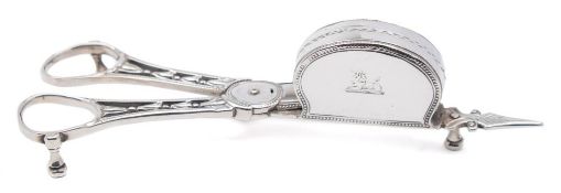 A pair of George III silver candle snuffers, maker I.