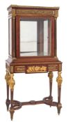 A fine Louis XVI style mahogany and gilt metal mounted vitrine in the manner of Paul Sormani:,