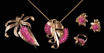 A suite of ruby mounted jewellery: of floral and ribbon designs with clusters of ruby beads,