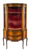 A French satinwood, kingwood veneered, inlaid and gilt metal mounted vitrine:,