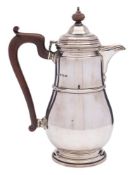 A George V silver hot water jug, maker Adie Brothers, Birmingham,