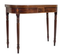 An early 19th Century mahogany and inlaid tea table of D-shaped outline:,
