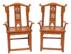 A pair of Chinese carved softwood open armchairs:,